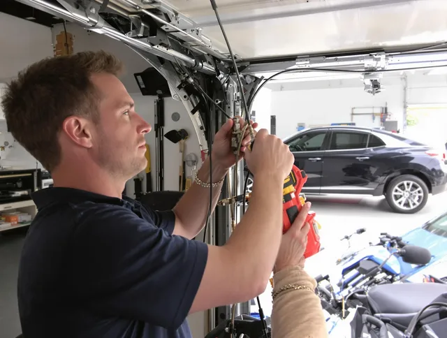 El Monte Garage Door Repair safety certified technician performing cable replacement in El Monte