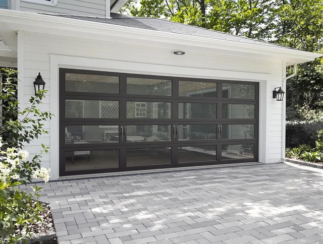 El Monte Garage Door Repair design specialist presenting custom garage door options to El Monte homeowner