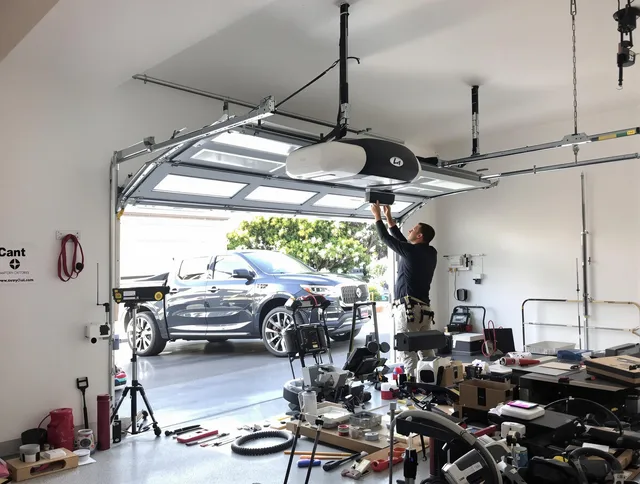 El Monte Garage Door Repair specialist installing smart garage door opener system in El Monte home