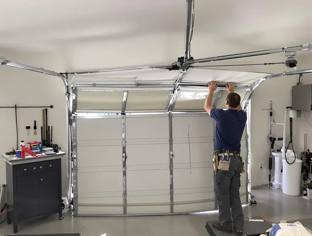 El Monte Garage Door Repair specialist performing precise section replacement on El Monte garage door